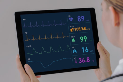 A person monitoring health condition on a tablet