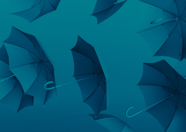 Opened umbrellas on a blue background