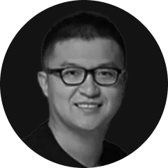 Black-and-white headshot of Patrick Dai