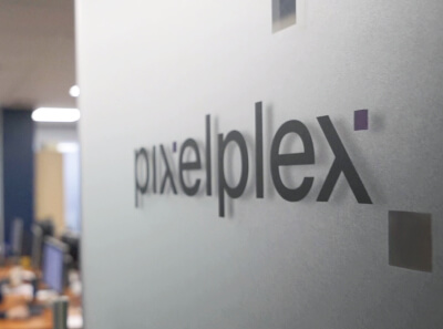  PixelPlex logo on a door to the office
