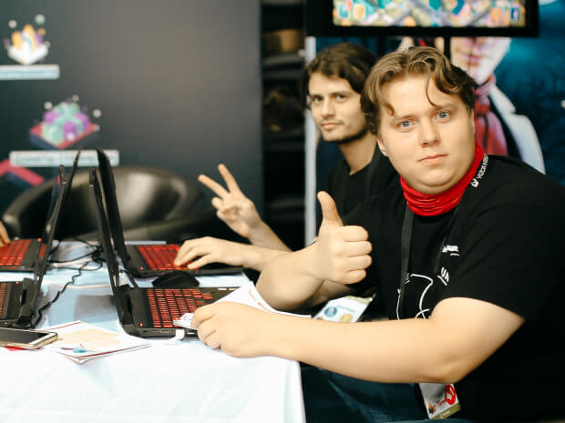 Members of game dev team of PixelPlex at the working space