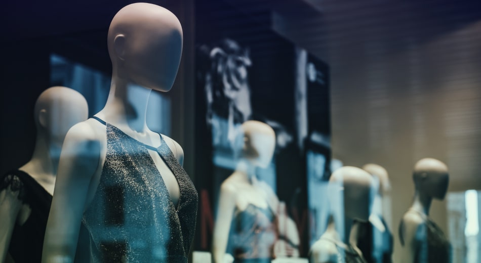 A mannequin stand demonstrating fashion clothing