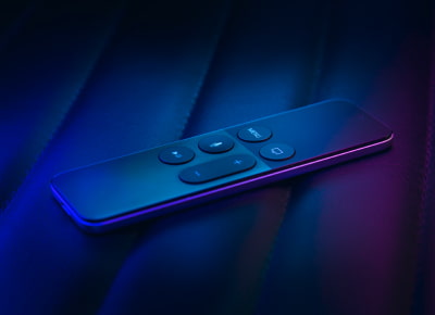 A black remote controller for Apple TV