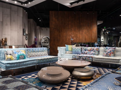 An interior design showroom where they demonstrate luxury couches and coffee tables