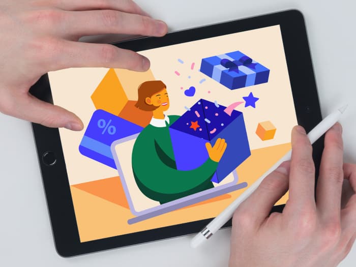 A person drawing an illustration on an iPad