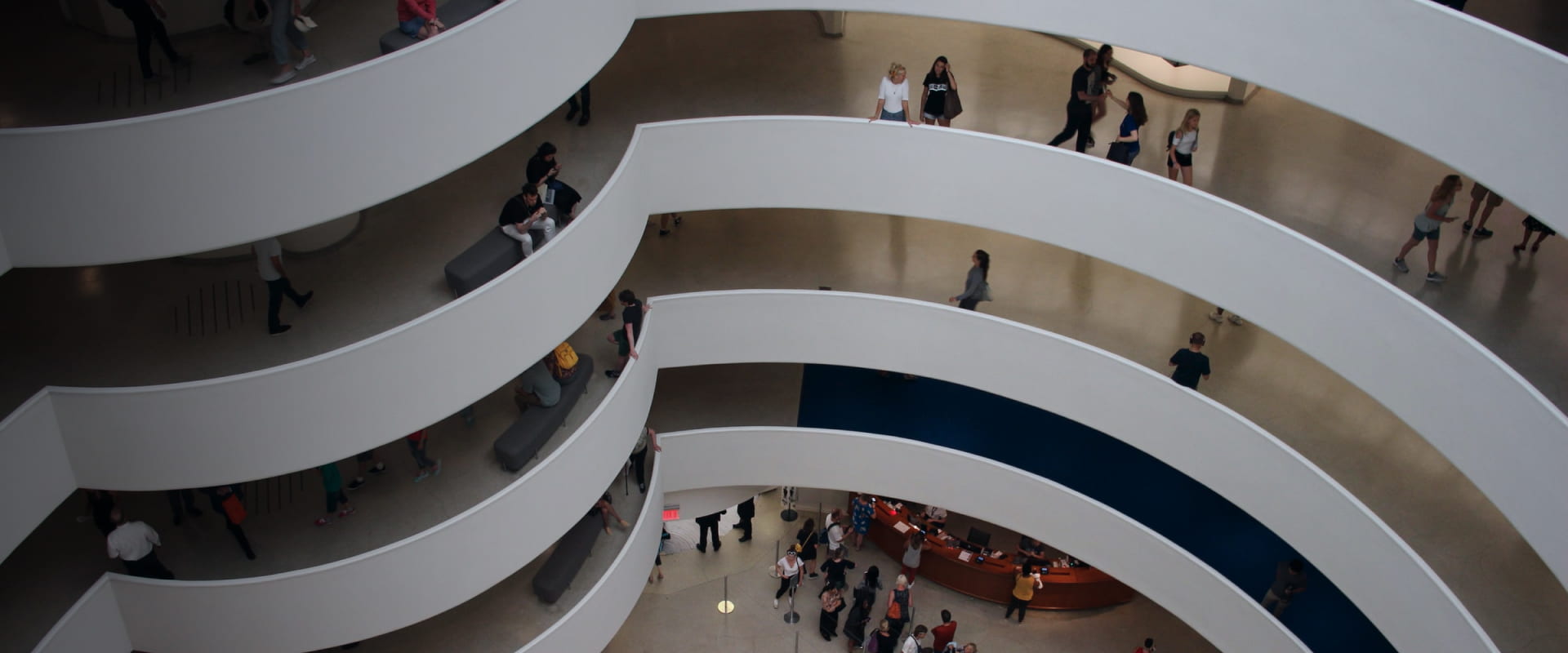 People inside of a five-floor mall