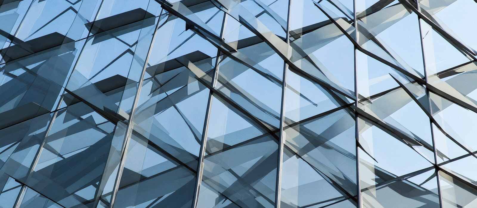 A glass skyscraper and Clutch logo