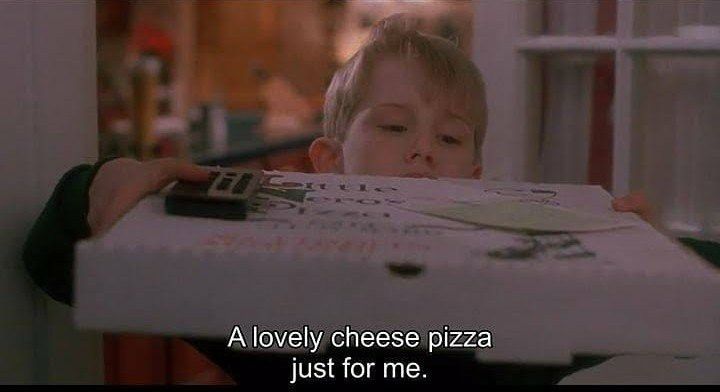 Kevin from Home alone picking up pizza delivery