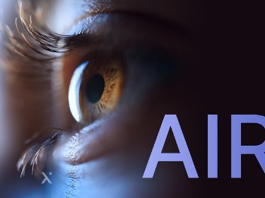 A human eye and several light points on the face