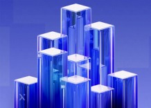 Abstract skyscraper design in blue and white, showcasing modern architectural elements against a clear sky.
