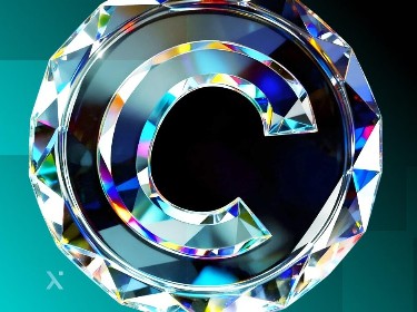 A diamond graphic with the letter C embedded within its facets.