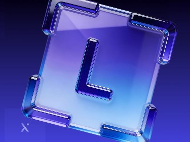 A blue and purple glass letter L displayed against a neutral background.
