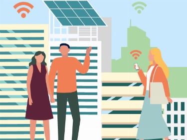 Three people next to a building with a solar panel in a smart city